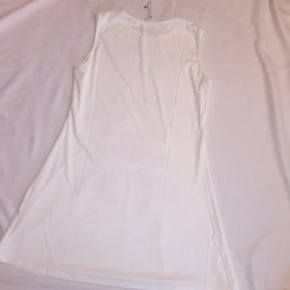 NWT white shift dress with floral print on front. - Picture 6 of 8